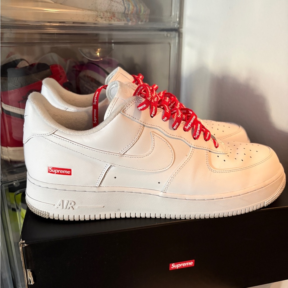 Supreme White Sneakers with Red Accents